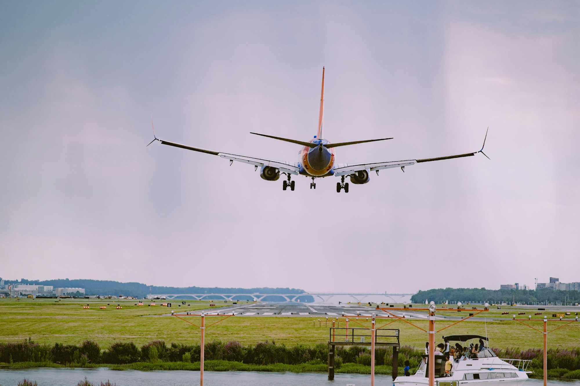 Airplane in flight in a cloudy sky